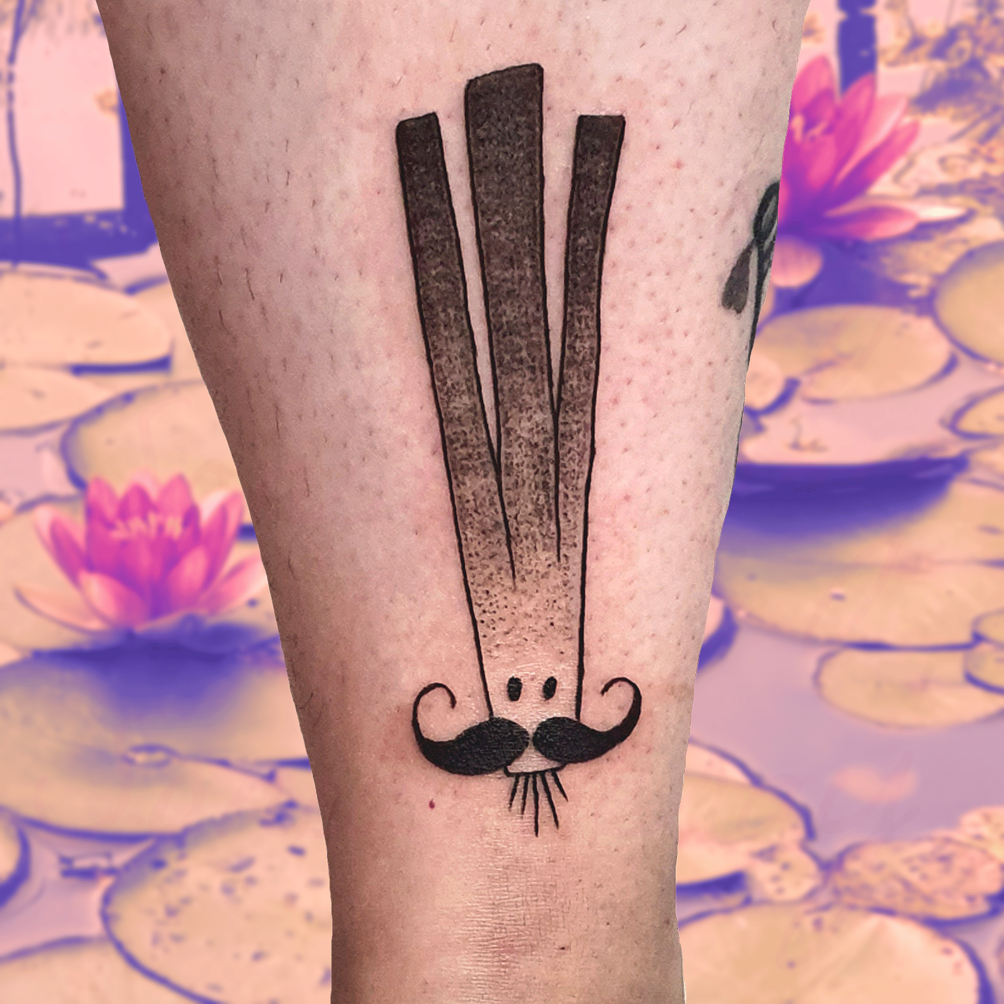 Photo tatouage d'un poireau avec une moustache : il s'agit d'Hercules Poirot évidemment